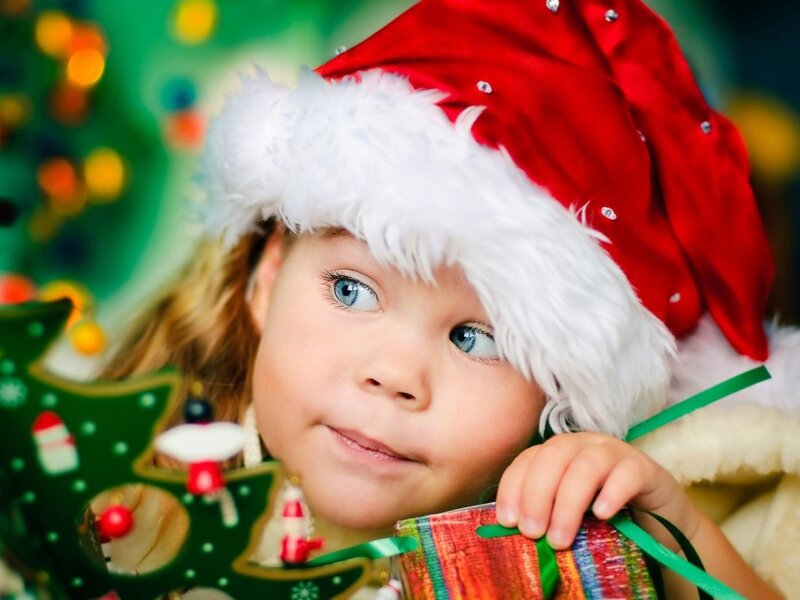 Child Wearing Santa Hat — Red