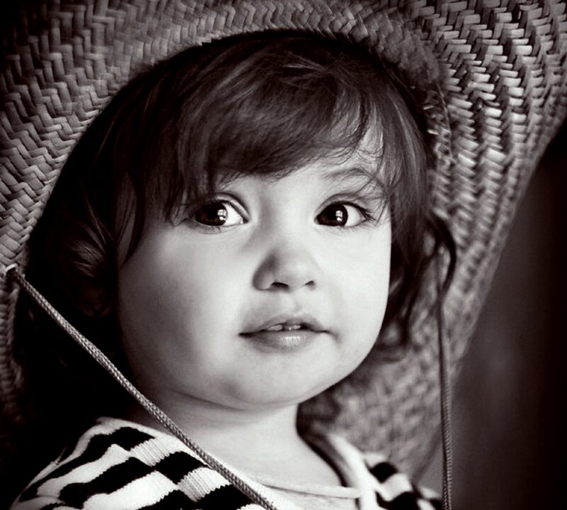 Child Wearing Straw Hat