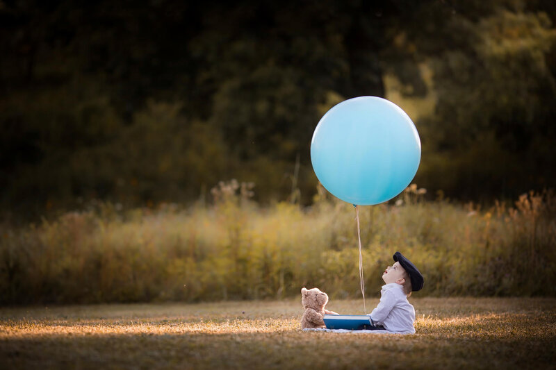 Child with Balloon and Teddy Bear