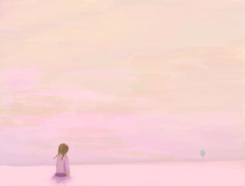 Child with balloon at sunset