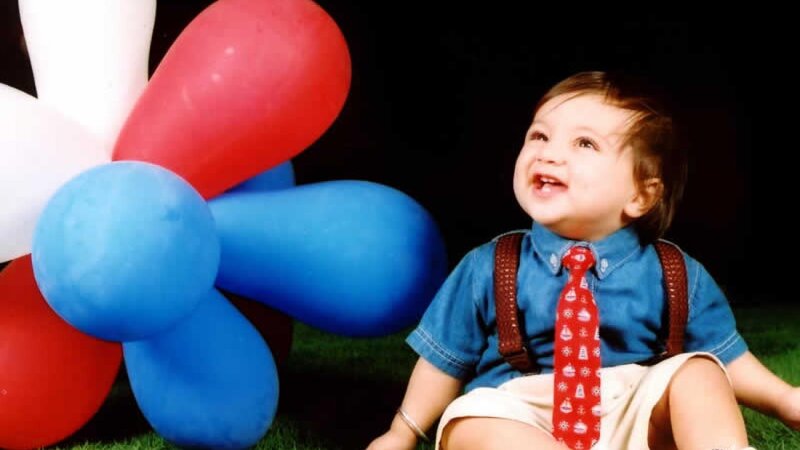 Child with Balloons