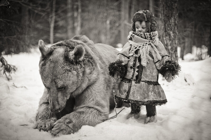 Child with Bear in Snow