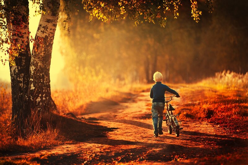Child with Bicycle — Orange