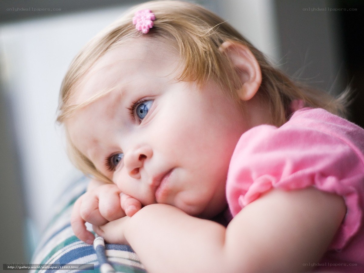 child with blue eyes resting