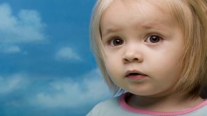 child with blue sky background
