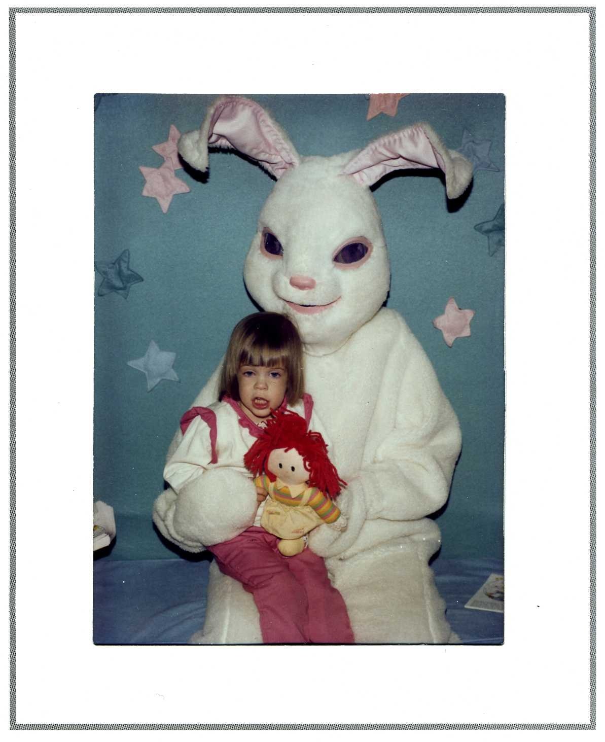 child with bunny mascot