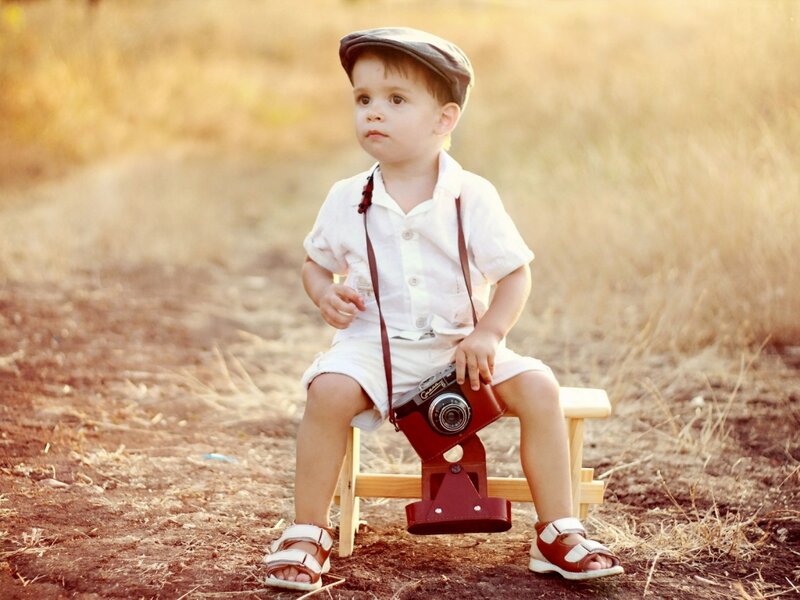 Child with Camera — Brown