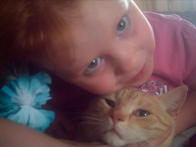 Child with Cat — Orange