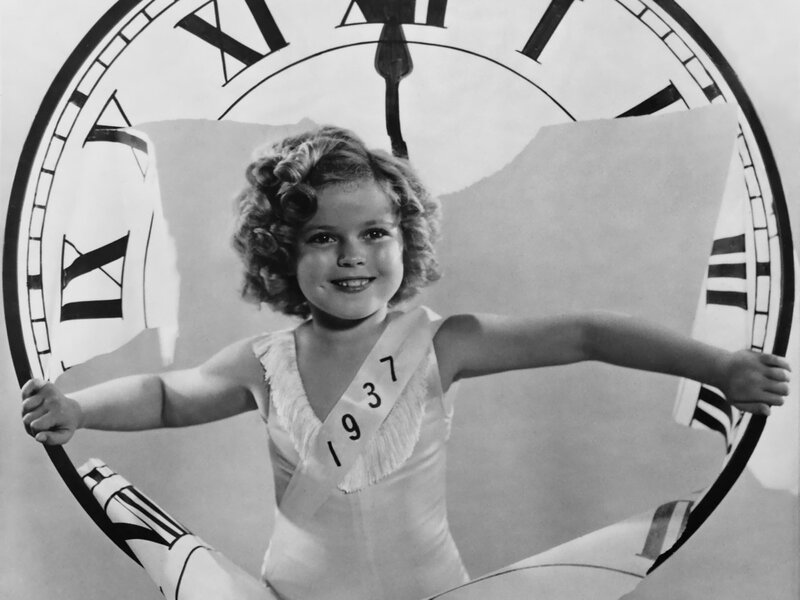 Child with Clock Backdrop