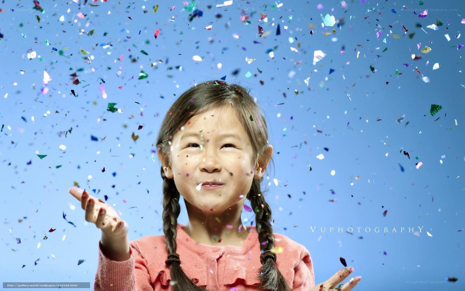 child with confetti celebration