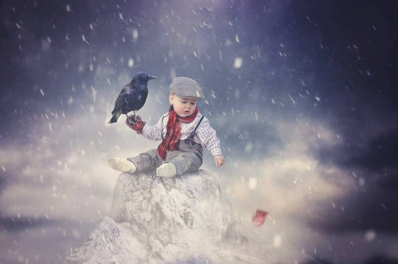 Child with Crow on Rock