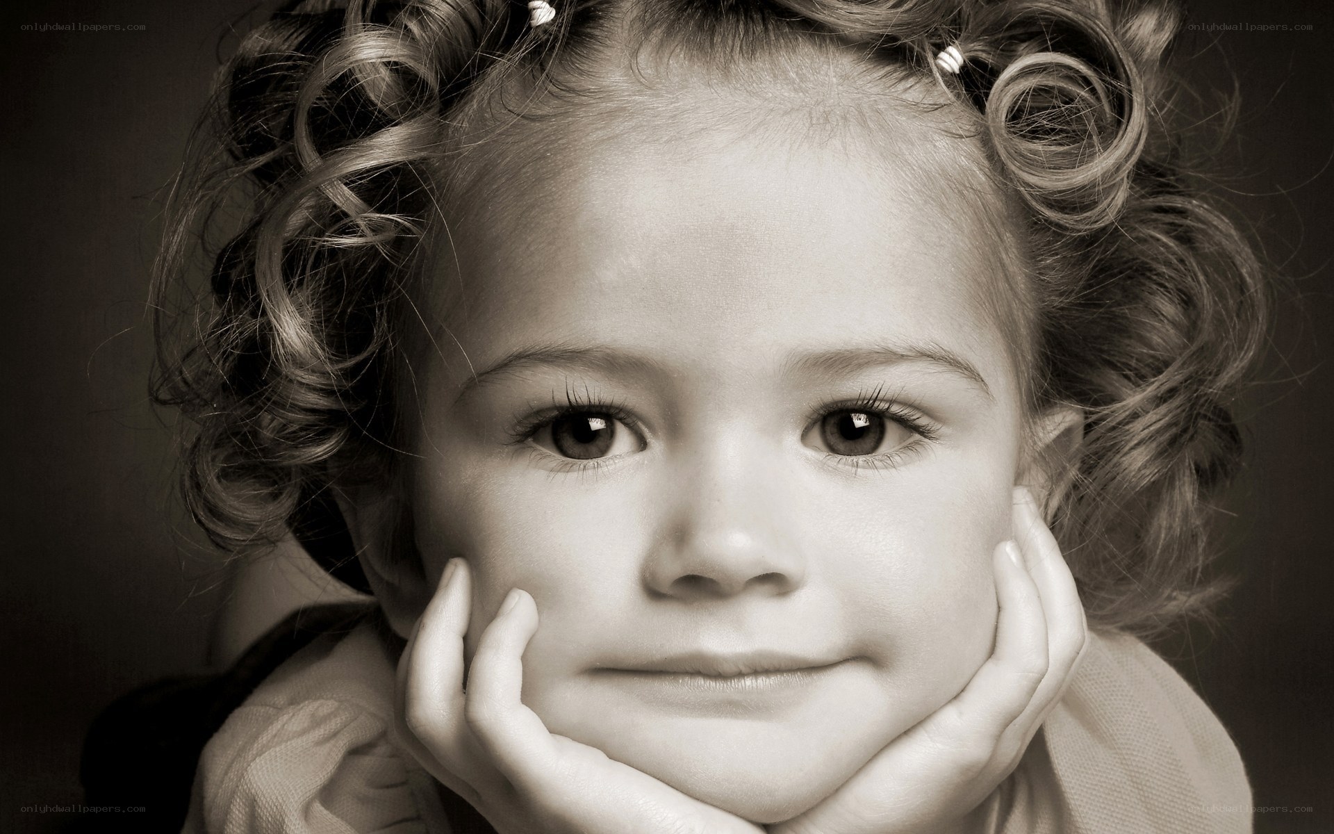 child with curly hair portrait