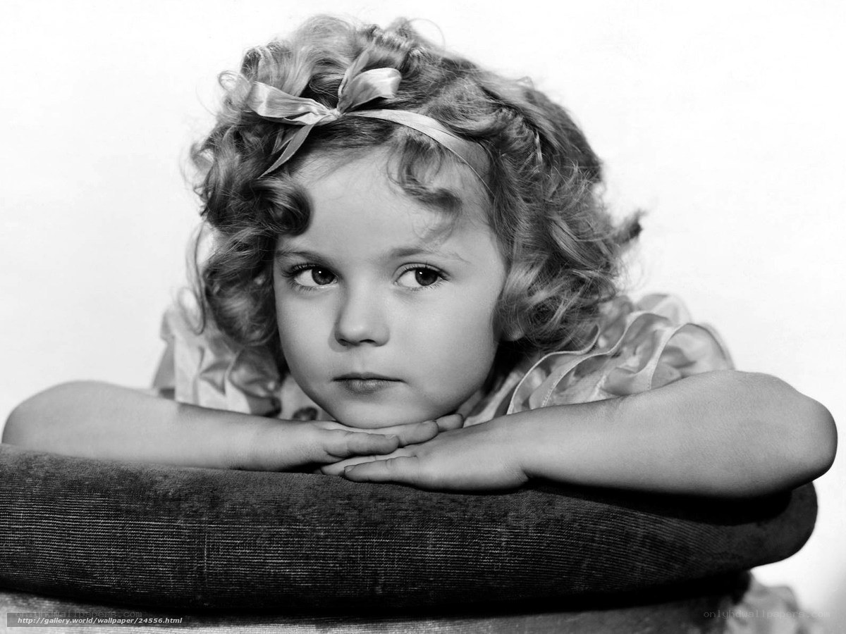 child with curly hair portrait