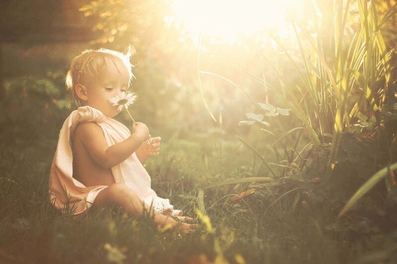 Child with Daisy
