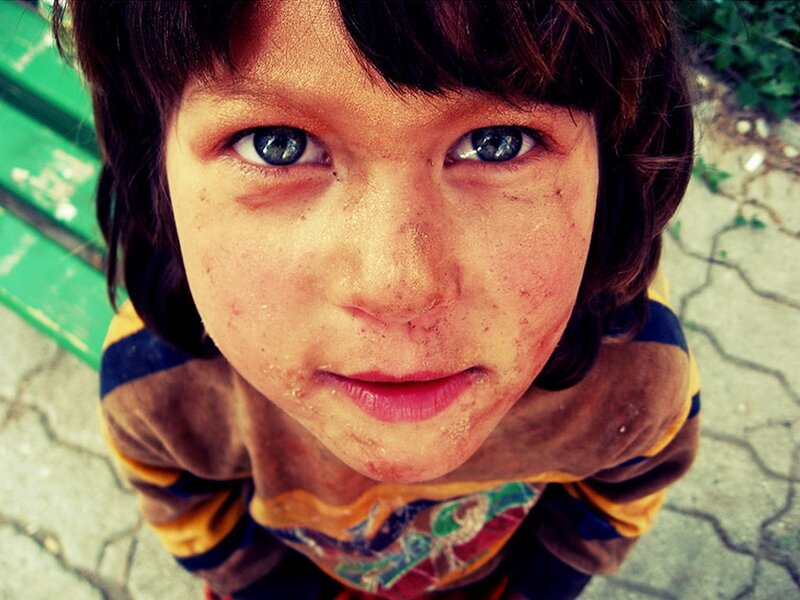 child with dirt on face