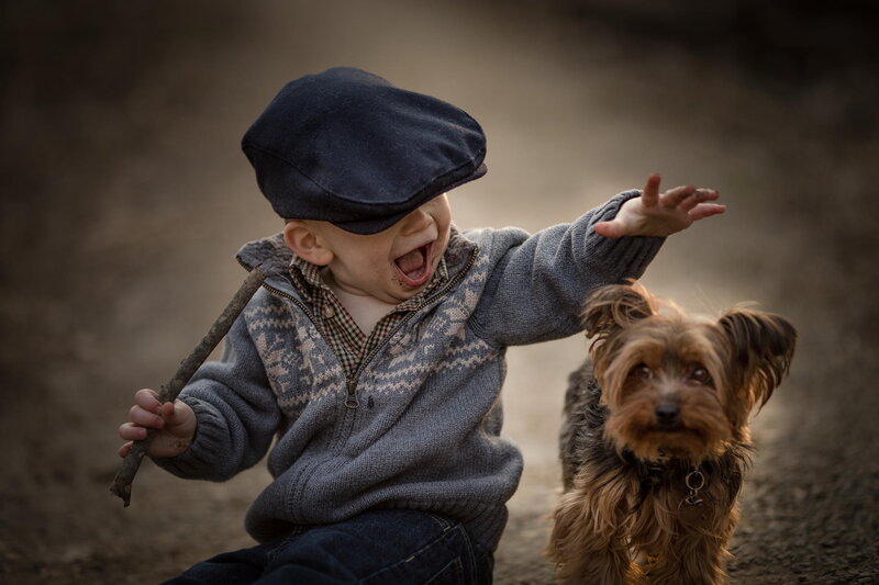 Child with Dog — Brown, Playful