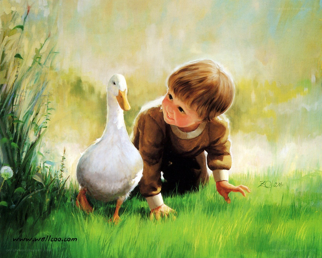 child with duck in grass