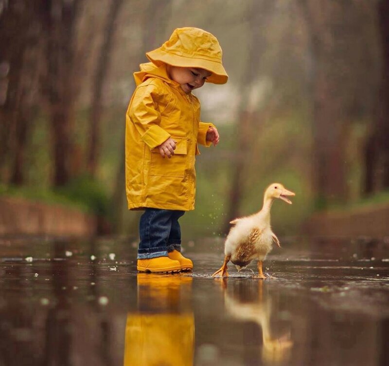 Child with Duckling