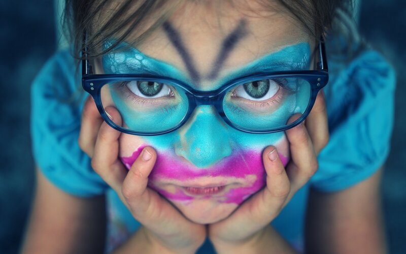 Child with Face Paint — Blue