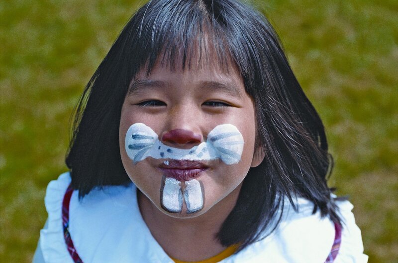 child with face paint