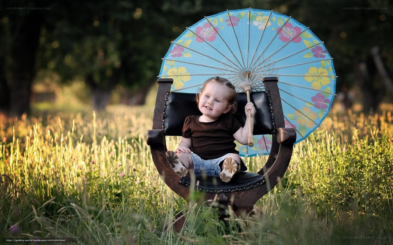 child with floral umbrella