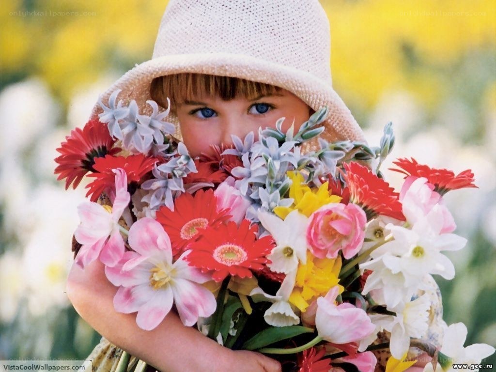 child with flower bouquet