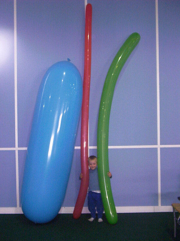 Child with giant balloons
