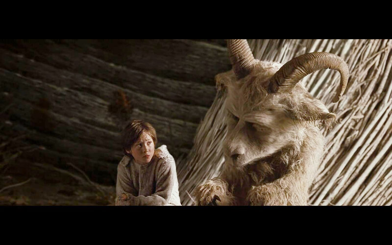 child with goat-like creature