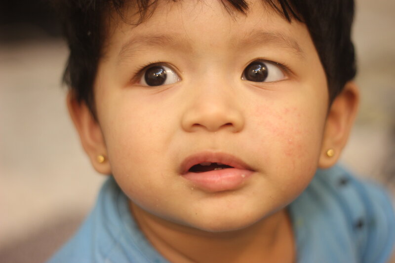 Child with Gold Earrings
