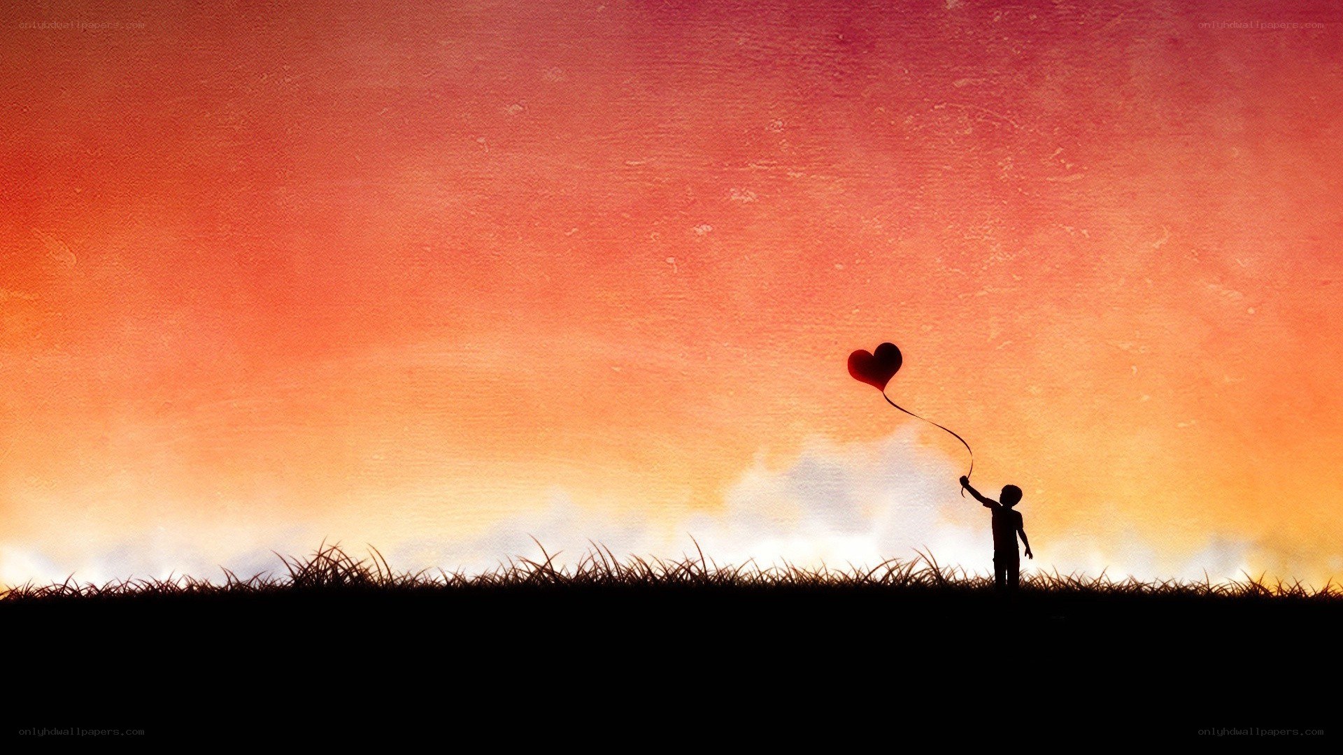 child with heart balloon