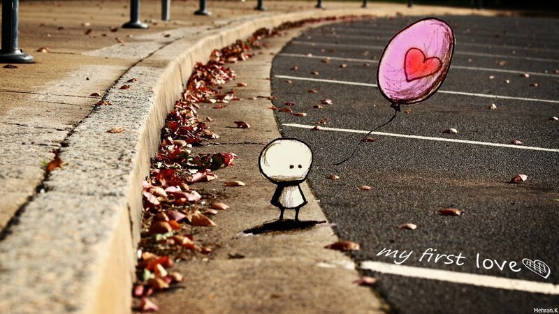 child with heart balloon