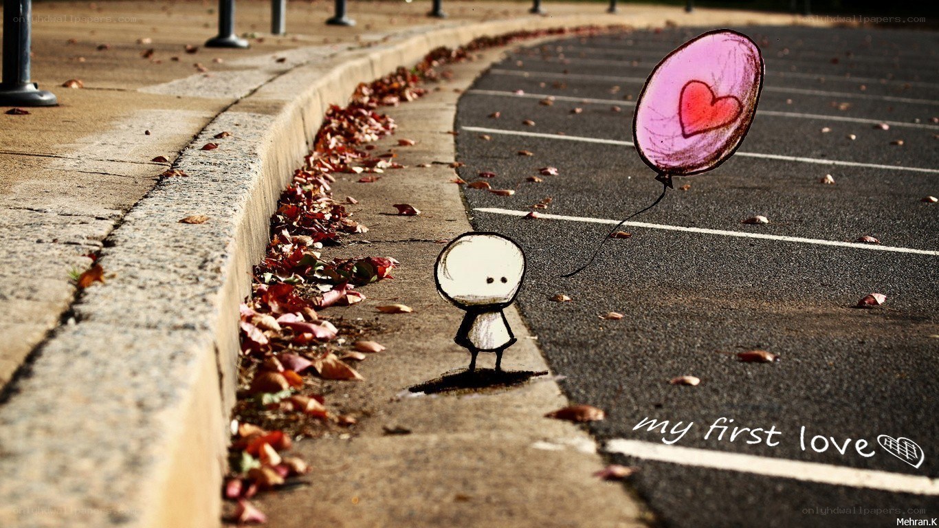 child with heart balloon
