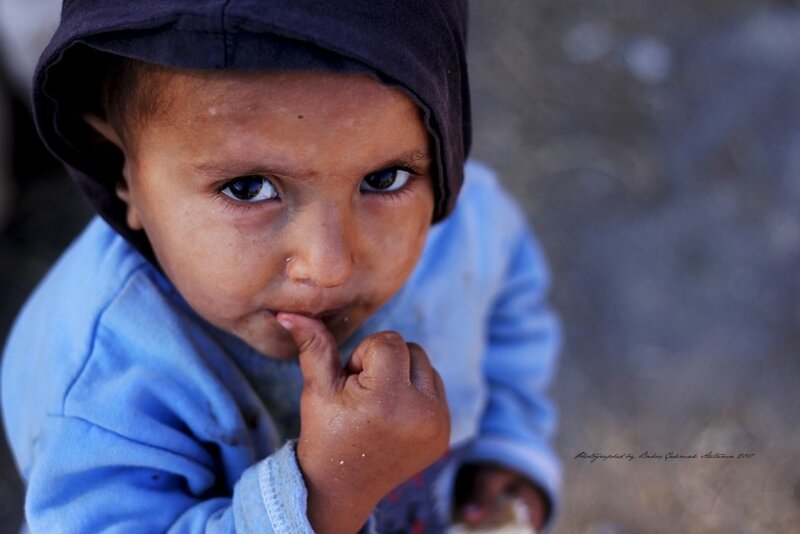 child with hooded jacket