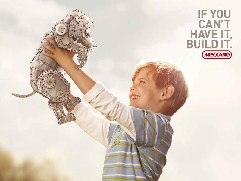 child with meccano robot