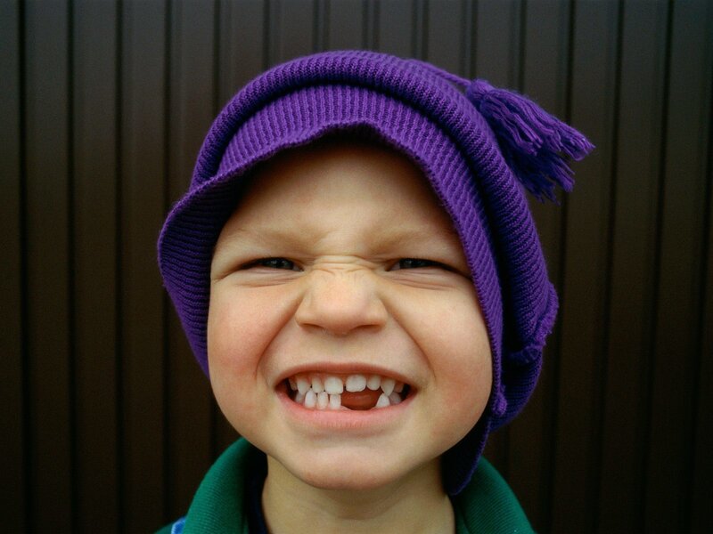 child with missing tooth
