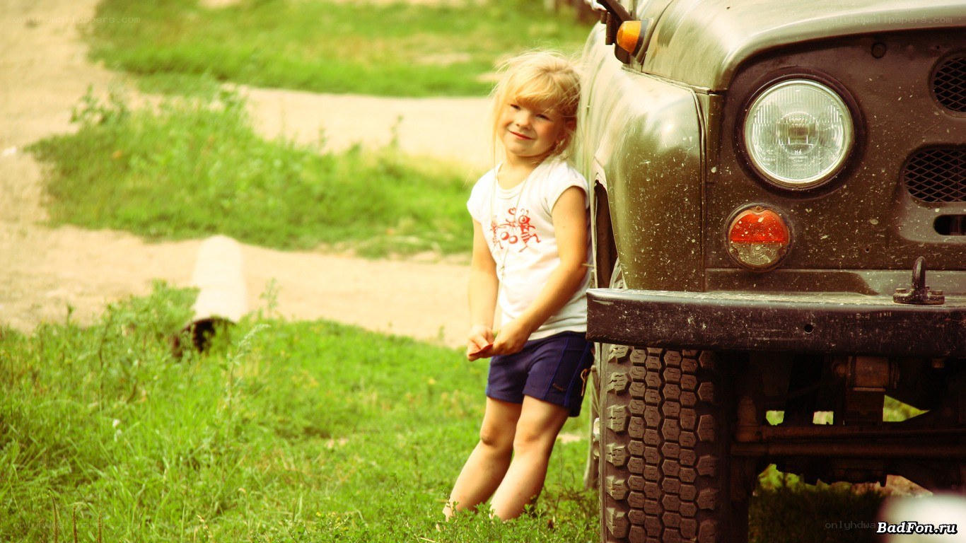 child with old truck