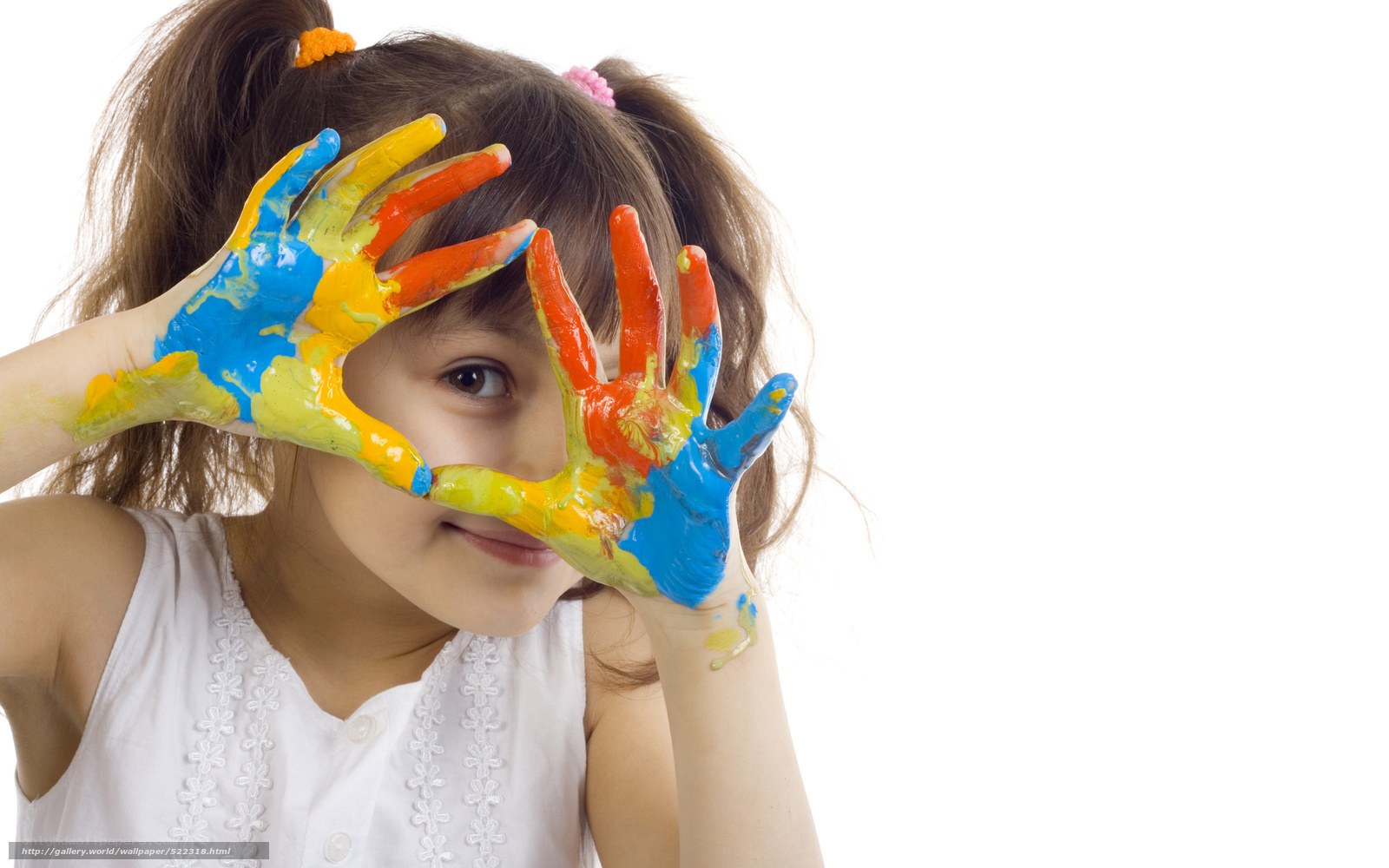 child with paint-covered hands