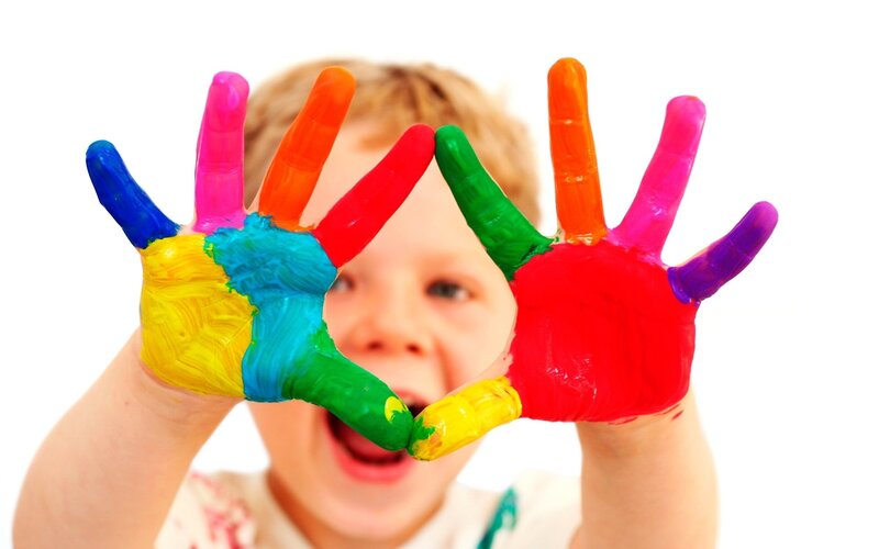 Child with Painted Hands — Red, Playful, Photograph