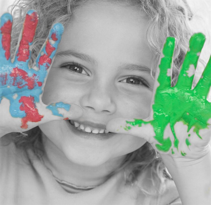 Child with Painted Hands — Red, Playful