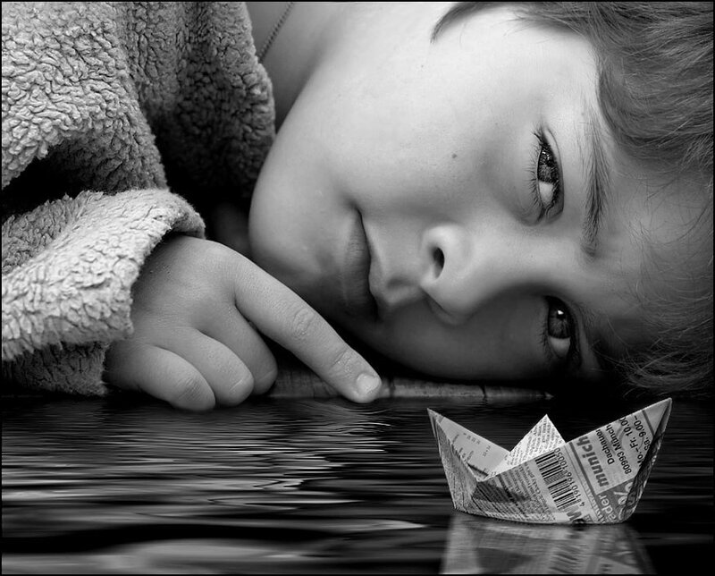 Child with Paper Boat