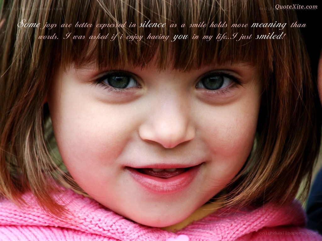 child with pink scarf
