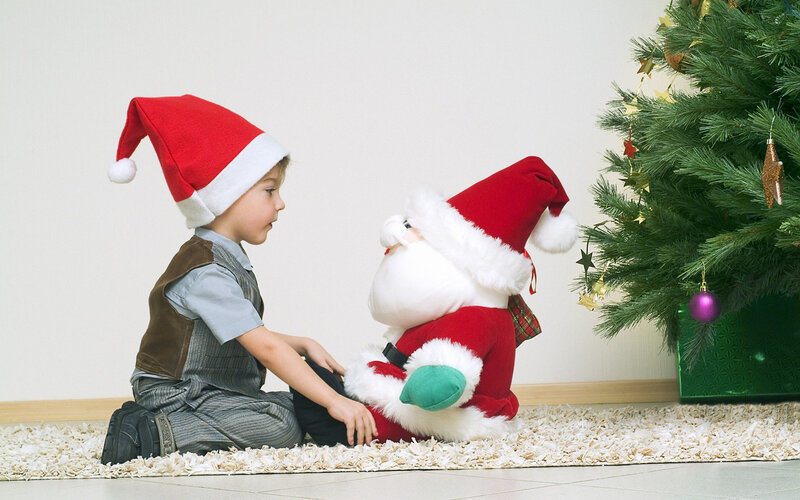 Child with Santa Doll