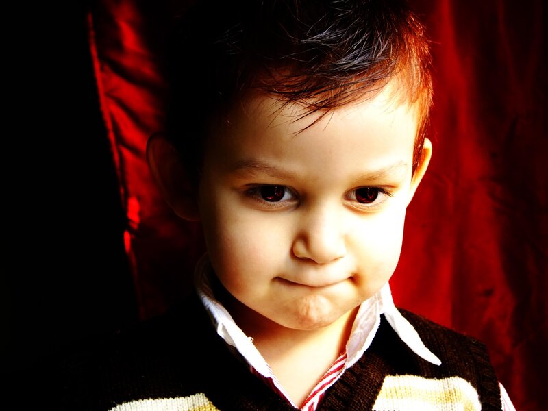 child with serious expression