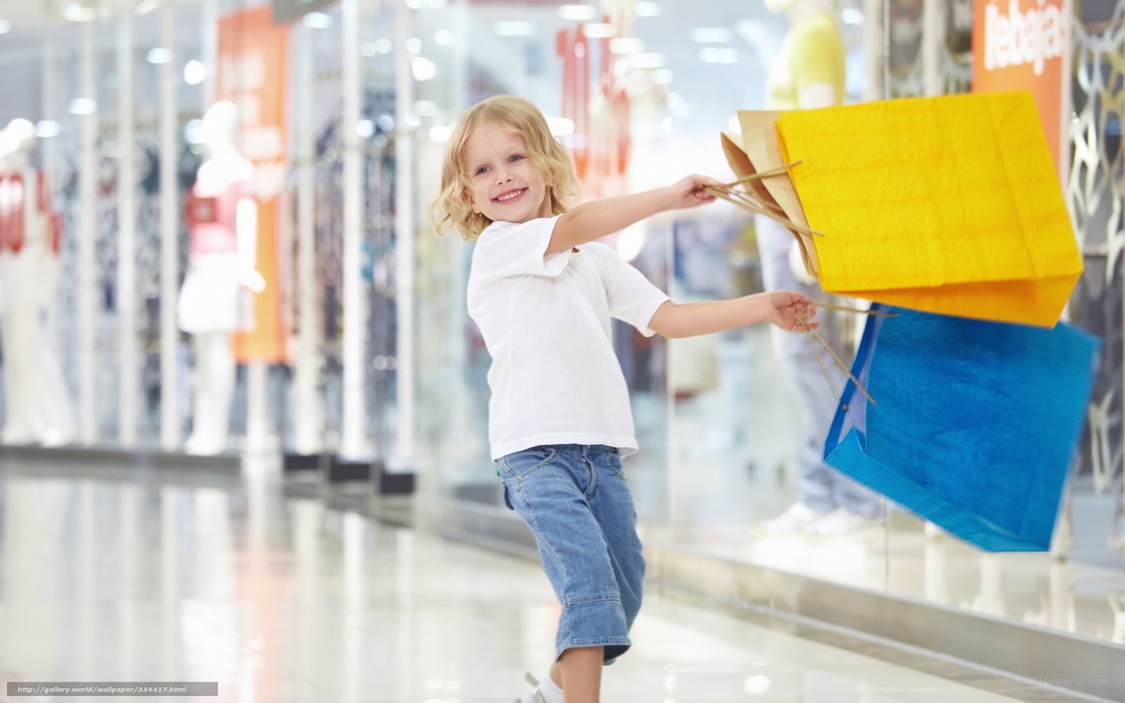 child with shopping bags