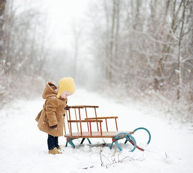 Child with Sled in Snow — White