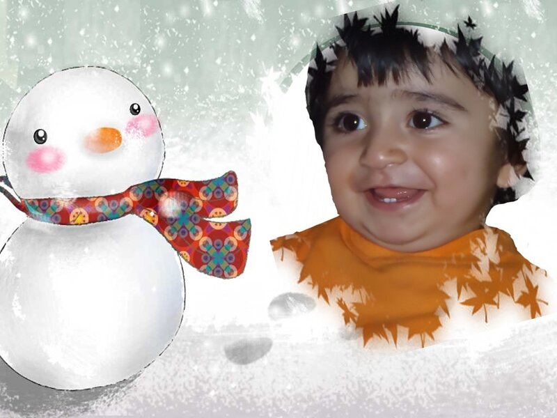 child with snowman photo