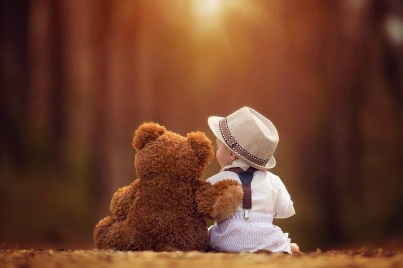 Child with Teddy Bear — Brown, Serene, Afternoon