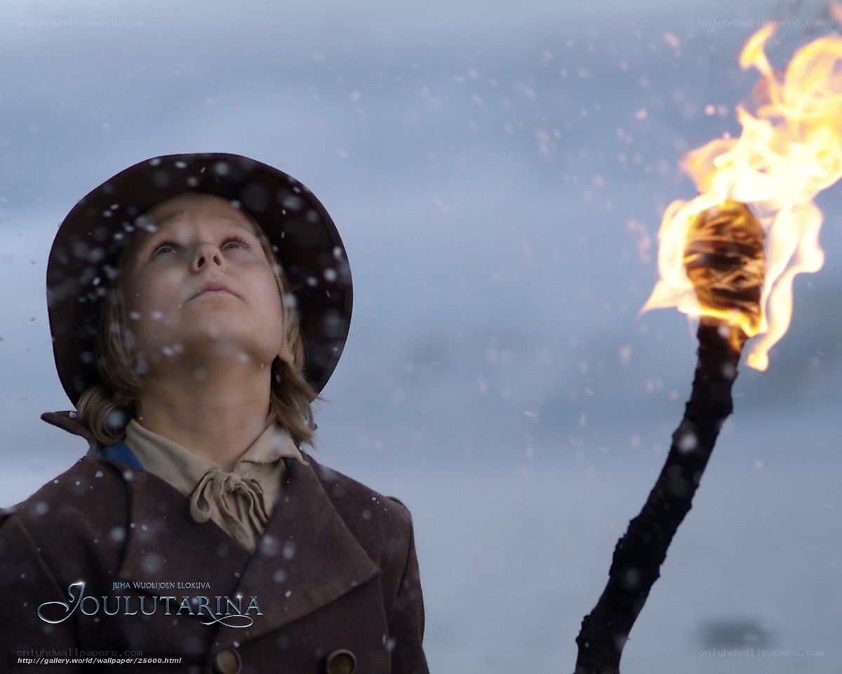 child with torch in snow