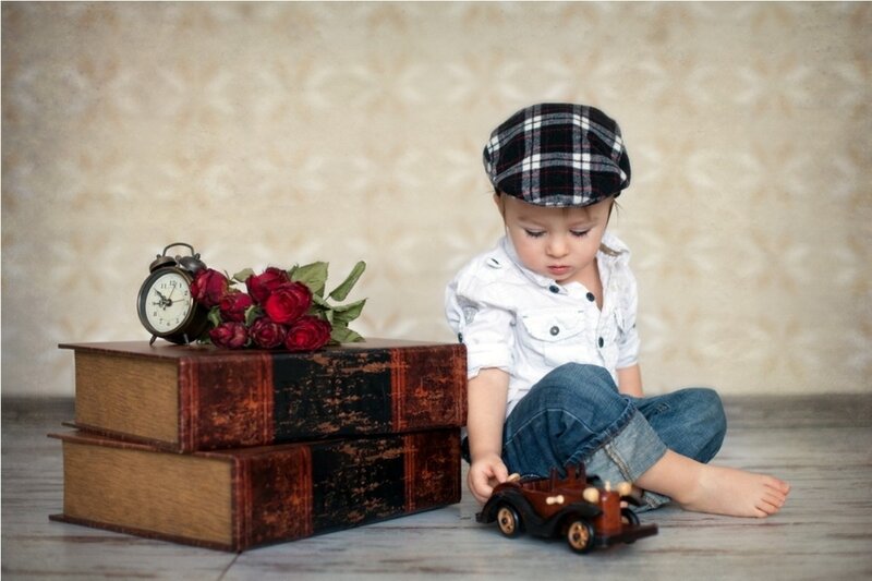 Child with Toy Car — Brown