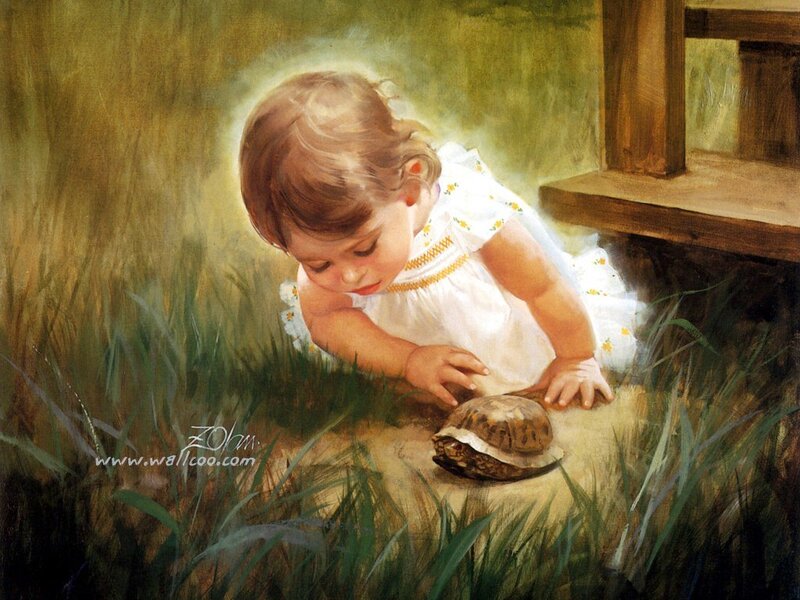 child with turtle in grass